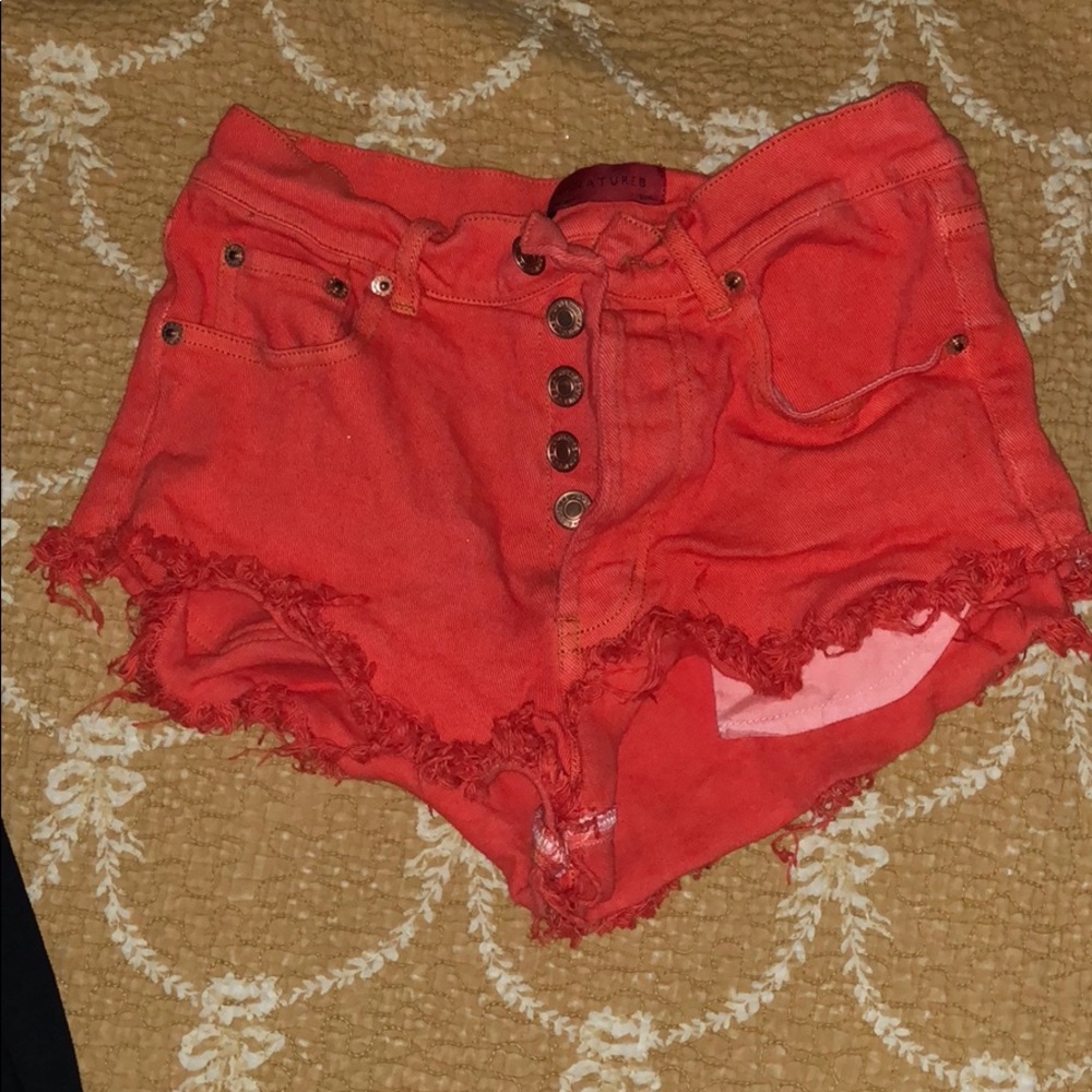 orange shorts with buttons not zipper!!!